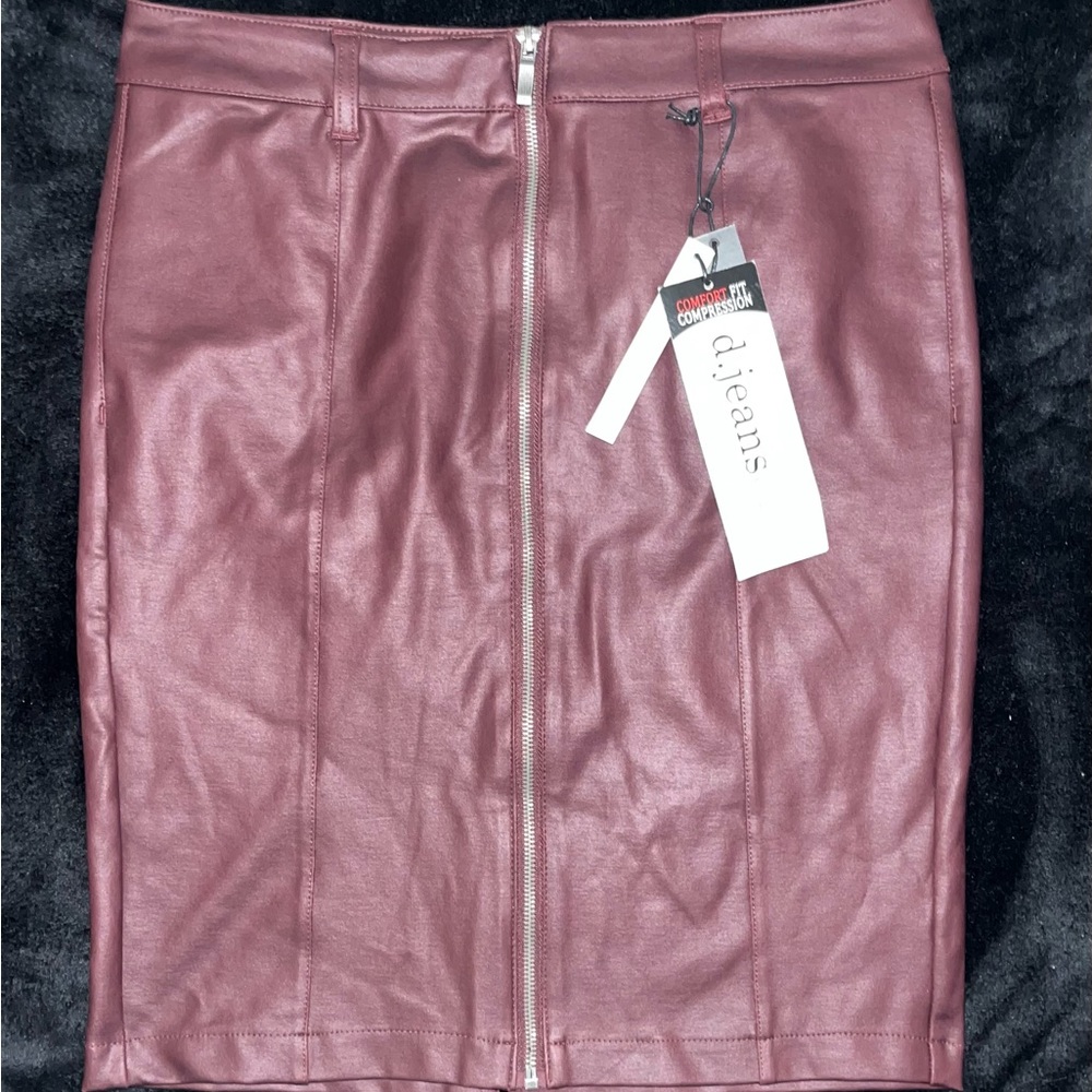 Maroon pleather skirt with zipper down the front.